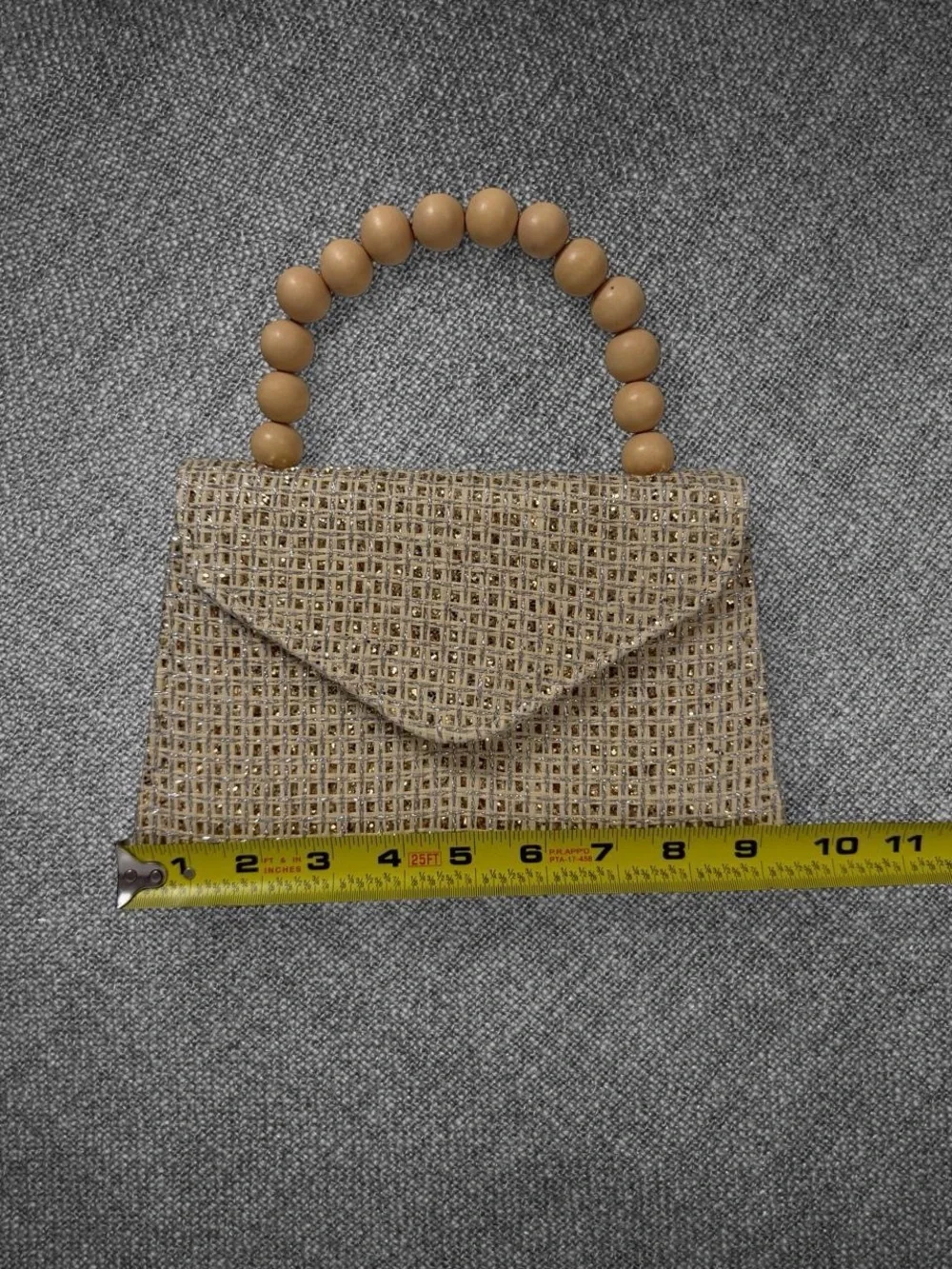 Metallic Gold Woven Envelope Handbag With Wooden Bead Handle And Chain Strap